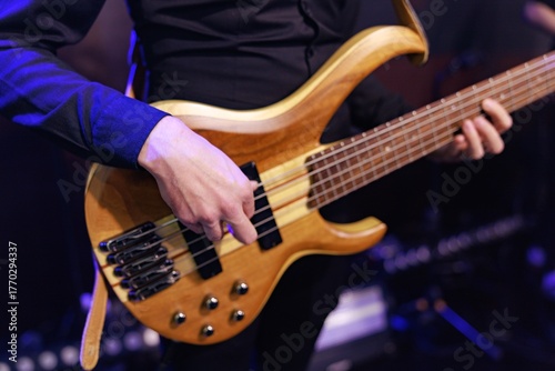 Musician Playing Electric Bass Guitar