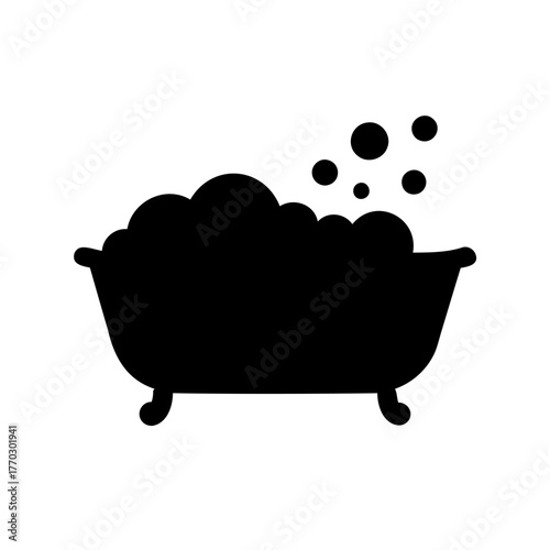 Black silhouette of bathtub filled with bubbles and floating soap particles