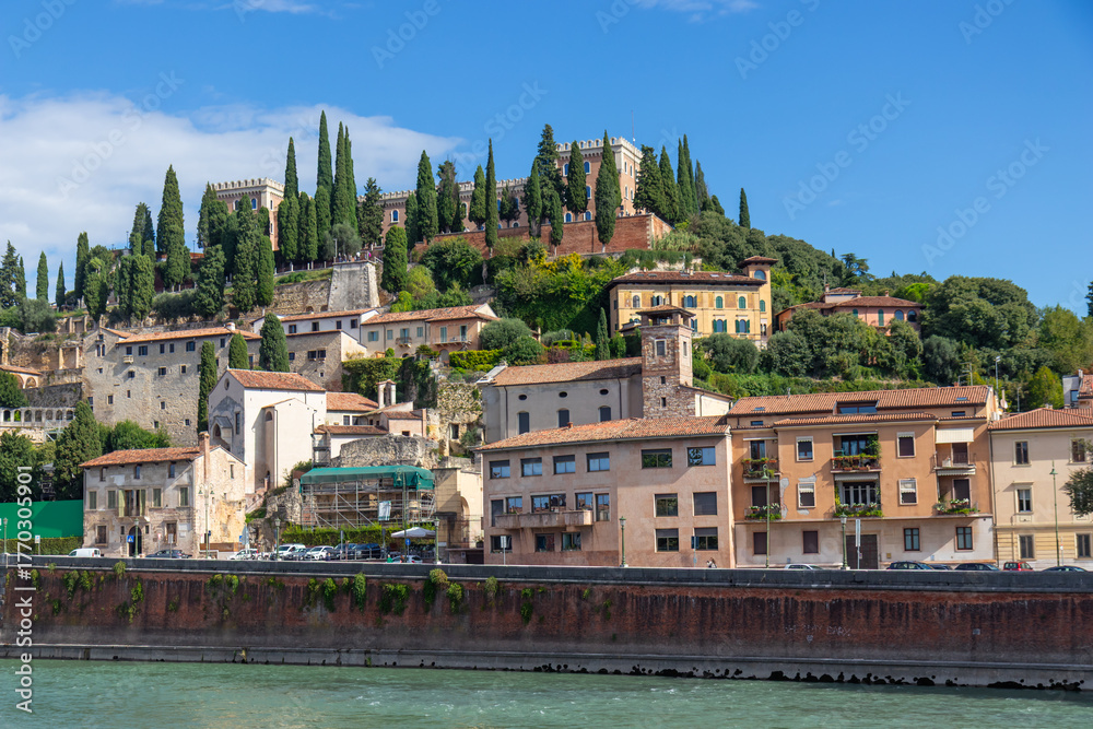Obraz premium Photo of San Pietro, an ancient castle on a hill in Verona, Italy, with a viewing platform overlooking the Adige River, offering panoramic views of the city, medieval architecture of Veneto region