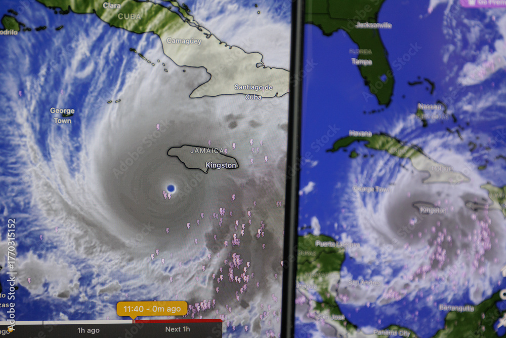 Fototapeta premium Hurricane Melissa shown on screen through windy app. Catastrophic storm towards Jamaica