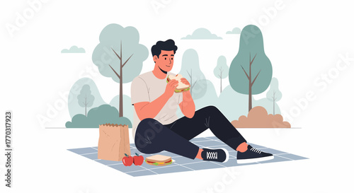 Man Enjoying Picnic Outdoors With Sandwich And Apples