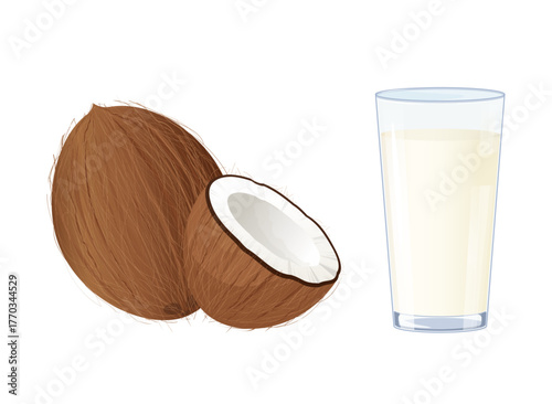 Coconut milk in glass with whole and halved coconut