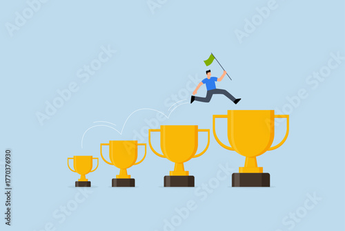 achievement to motivate to achieve bigger goal, businessman jumping from small win trophy to get bigger one.
