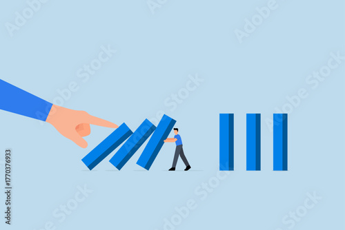 Risk management, businessman stop risk of domino effect from threats and disaster.