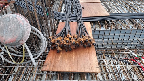 prestressing steel strands and rebar at construction site