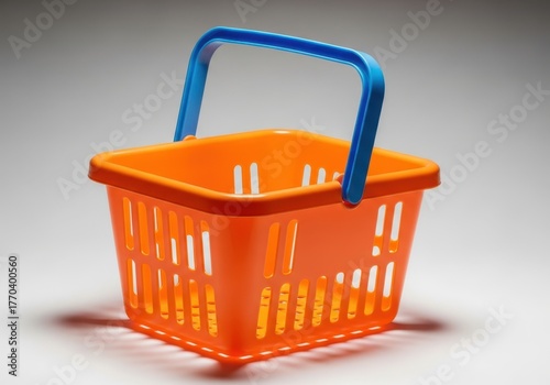 Bright orange plastic shopping basket with blue handle isolated and ready for use