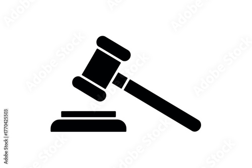 A gavel is poised to strike a block, symbolizing justice and legal proceedings.