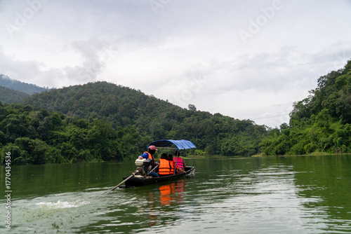 A boat with a man and a woman in it
