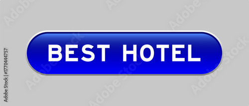 Blue color capsule shape button with word best hotel on gray background