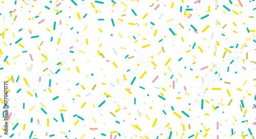 A cheerful and vibrant seamless pattern of colorful sprinkles and dots, scattered randomly on a clean white background, creating a playful texture.