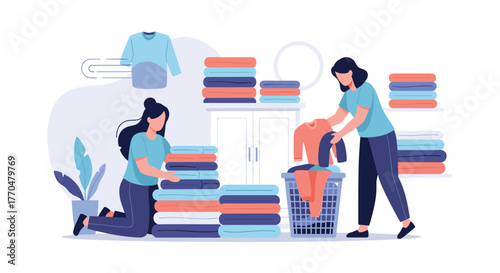 Two women are diligently folding and stacking clean laundry, organizing clothes in a neat and tidy home environment.