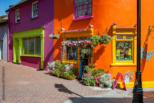 Quaint street lined with vibrant colorful buildings in the Old Town of Kinsale, County Cork, Ireland