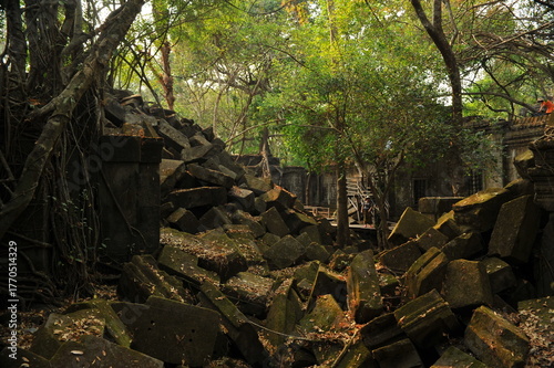 Collapsed large sandstones bridge at ruins of Beng Mealea Temple in the middle of jungle in Cambodia.