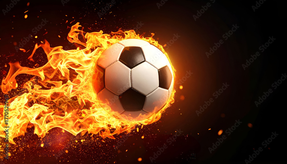 Fototapeta premium Soccer ball on fire with glowing flame trail, dramatic sports energy and action concept.