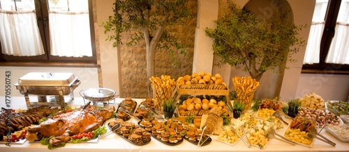 well decorated catering food on a table, celebration theme