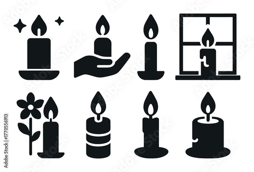 Set of eight black candle silhouettes with various designs on dark background