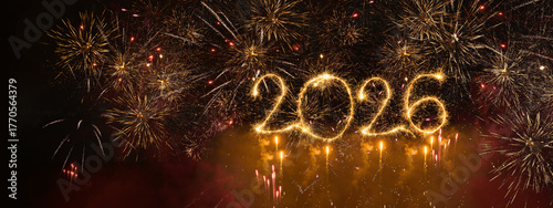 happy new year, new year's eve, silvester, new year, celebration greeting card, new year card - Year 2026 in sparkler font and firework fireworks pyrotechnic, isolated on black night sky background