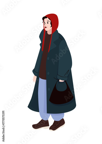 Woman in oversized dark coat and red hood carrying black handbag dressed for cold weather in casual winter street style