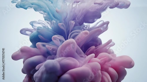 Mesmerizing Swirls of Vibrant Ink Cloud Bloom and Dissolve in Water Abstract Artistry.