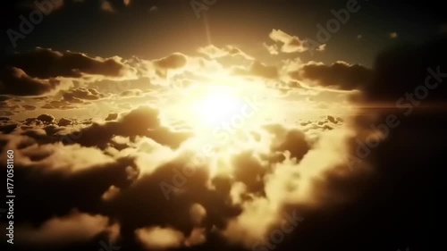 Sunset over clouds with golden light.