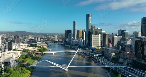 4K Aerial Locked off stationary motion of west side Brisbane CBD, known as South Bank Precinct with new buildings and new pedestrian bridge called Neville Bonner Bridge, Brisbane, QLD, Australia
