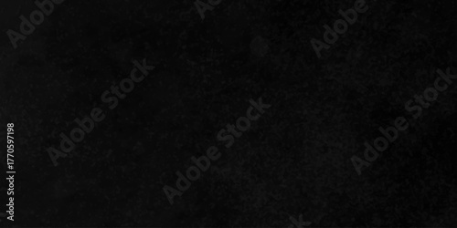 Distressed rough black cracked wall slate texture wall grunge backdrop smoke background. Stone concrete texture anthracite panorama. Old vintage charcoal night dark black stucco design.	