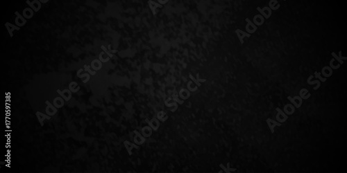 Distressed rough black cracked wall slate texture wall grunge backdrop smoke background. Stone concrete texture anthracite panorama. Old vintage charcoal night dark black stucco design.	
