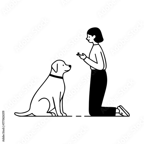Woman kneeling to train her dog using a treat as a reward, representing obedience training and positive reinforcement.