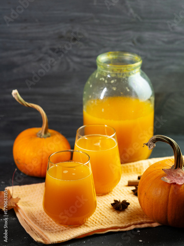 Homemade Pumpkin Juice in Glasses. Jarred Preparation