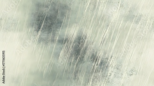 Diagonal streaks of light and dark blend across a muted, textured background surface