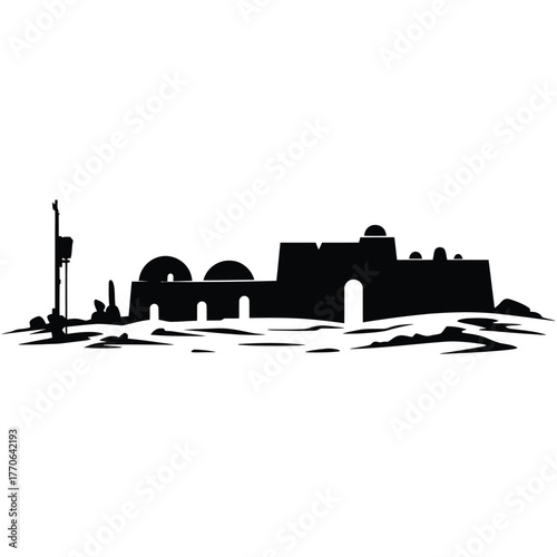 Silhouette of ancient desert ruins with a flagpole