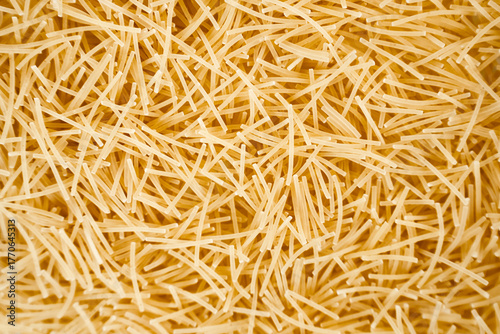 Cuadro en lienzo Thin vermicelli noodles on white background with text space