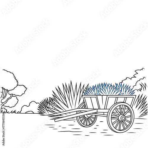 Rustic wooden cart filled with hay in a field