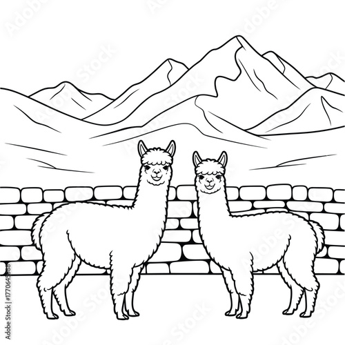 Two alpacas standing in front of a stone wall and mountains