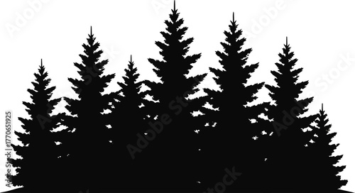 Black silhouette of a dense forest tree line