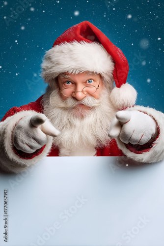 Wallpaper Mural Joyful Santa Claus points at you with a snowy background, embodying the spirit of Christmas and holiday cheer. Torontodigital.ca