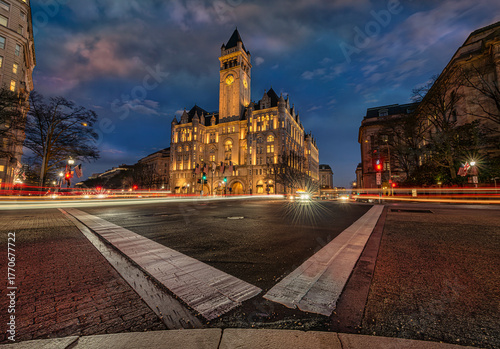 Evening view of a grand historic building under a deep blue sky with streaks of car lights. Washington DC, WA, USA