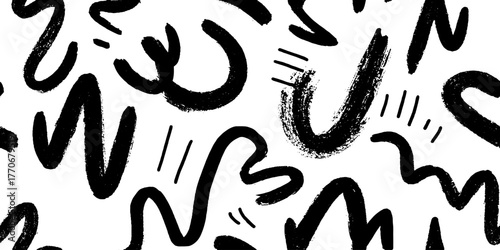 Minimalist abstract black and white pattern of chaotic brushstrokes and scribbles