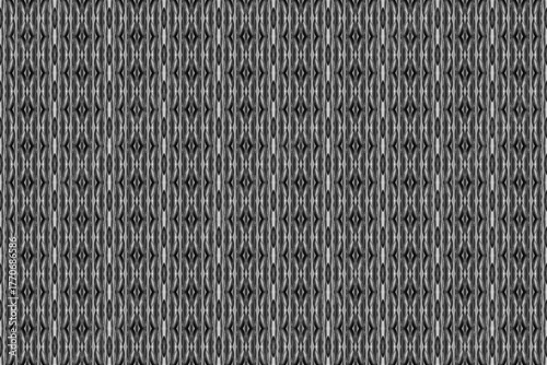 Abstract seamless black and gray geometric pattern with a textured, symmetrical design. The repeating vertical shapes and intricate details, creating a modern, industrial, and elegant appearance.