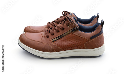 Pair of new brown leather men's shoes isolated.