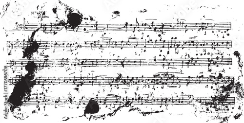 Torn sheet music with ink splatters notes clef