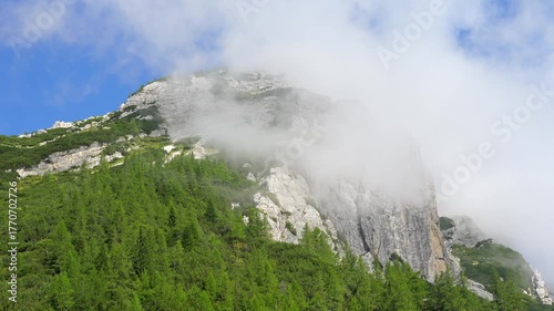High mountain rock face in the Alps as it passes the pass of Vrsic, Slovenia.