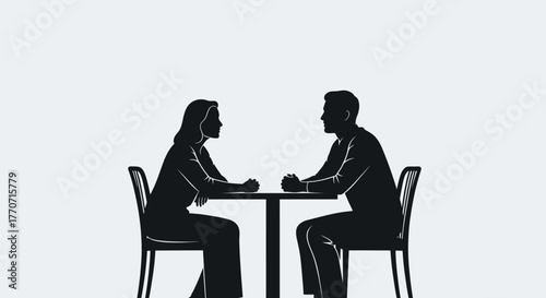 Silhouette illustration of a man and woman seated opposite each other at a table, on a plain background