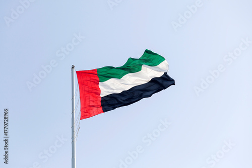 UAE flag in Abu Dhabi waving outdoor. UAE National day. UAE flag day.