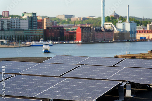 Solar panels on roof of apartment building, renewable green sustainable energy concept, water cooling, aerial view, Gothenburg, Sweden