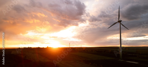 Wind turbines parks are adopted renewable energy technologies used to generate electricity sustainably.Green energy reduces pollution and keeps the environment clean and sustainable.
