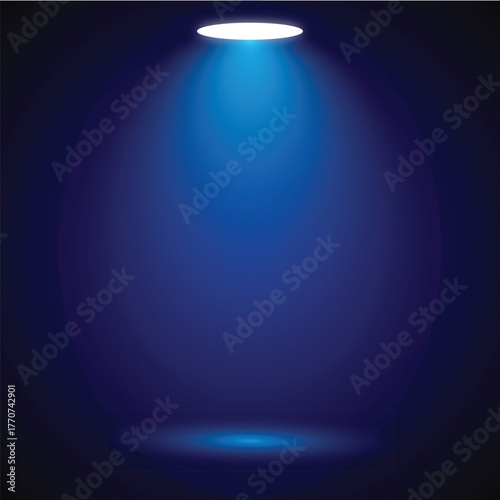 A single spotlight shines brightly on a dark navy blue background