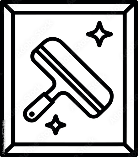 A squeegee is used to clean a window, leaving it sparkling clean.