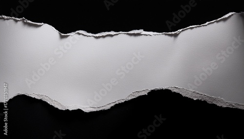 Ripped Paper On Black Background