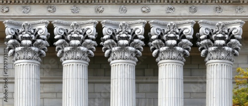Historic architectural columns showcase detailed craftsmanship at a prominent building in the city, reflecting classical design elements and city heritage